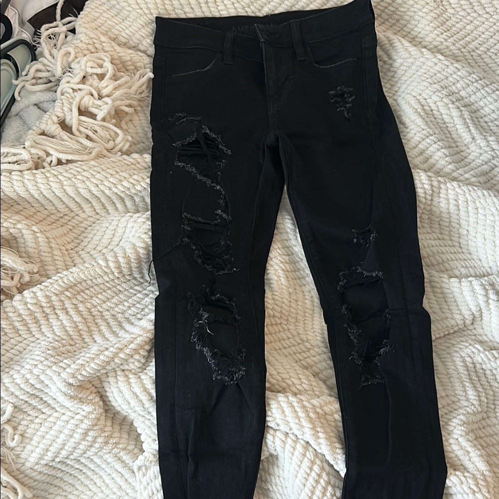 Black American Eagle Ripped Skinny Jeans